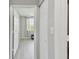 Bedroom view features an open doorway and closet at 5401 Bentgrass Dr # 1-302, Sarasota, FL 34235