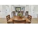 Cozy dining area with seating for four at the tables and an area for coffee prep at 5401 Bentgrass Dr # 1-302, Sarasota, FL 34235