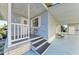 The single-story home includes a charming front porch perfect for relaxation and enjoying the outdoors at 5619 Bayshore Rd # 107, Palmetto, FL 34221
