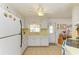 Efficient kitchen featuring white cabinetry, appliances, and ample counter space at 5619 Bayshore Rd # 107, Palmetto, FL 34221