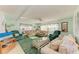 Spacious living room with a comfortable seating arrangement and plenty of natural light at 5619 Bayshore Rd # 107, Palmetto, FL 34221