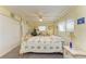Charming main bedroom boasts a canopy bed, natural light, and ample closet space at 5619 Bayshore Rd # 107, Palmetto, FL 34221