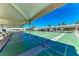 Enjoy outdoor activities at the community shuffleboard courts with covered seating and well-maintained surfaces at 5619 Bayshore Rd # 107, Palmetto, FL 34221