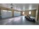 Spacious garage with two electric door openers, two windows, and room for two cars or storage at 5714 38Th E Ave, Bradenton, FL 34208
