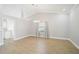 Spacious living area with tile floors, natural light, and easy access to kitchen area at 6017 Marella Dr, Sarasota, FL 34243
