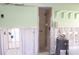 Bathroom with tiled shower stall and walls exposed showing the framing at 618 Gladstone Ln, Holmes Beach, FL 34217