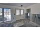 Renovation view of entryway showing unfinished walls and a large window at 618 Gladstone Ln, Holmes Beach, FL 34217