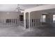 Large living room featuring studs, ceiling fan, and windows for natural light at 618 Gladstone Ln, Holmes Beach, FL 34217