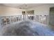 Renovation view of living room showing unfinished walls and exposed flooring at 618 Gladstone Ln, Holmes Beach, FL 34217