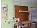 Work area with overhead lighting and vintage accent lamps at 618 Gladstone Ln, Holmes Beach, FL 34217