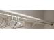 A clothing rod inside of a closet is shown with several empty hangers hanging on the rod at 633 Cervina S Dr, Venice, FL 34285