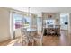 Cozy dining area features lots of natural light and easy access to both the kitchen and Florida room at 633 Cervina S Dr, Venice, FL 34285
