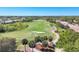 Picturesque golf course with lush green fairways and manicured sand traps at 6540 The Masters Ave, Lakewood Ranch, FL 34202