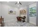 Comfortable home office with neutral walls, wooden desk, decor and soft natural light for a productive workspace at 6540 The Masters Ave, Lakewood Ranch, FL 34202