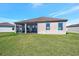 This home features a screened lanai and a spacious backyard, perfect for outdoor gatherings at 6620 35Th E Ct, Sarasota, FL 34243