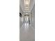 Foyer leading to the entrance, highlighting tray ceiling, chandelier and double-door entry at 6620 35Th E Ct, Sarasota, FL 34243