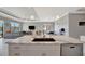 Open concept kitchen featuring marble island overlooking the great room and eat in nook at 6620 35Th E Ct, Sarasota, FL 34243