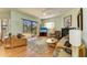 Comfortable living room with sliding glass doors to lanai and backyard at 7102 42Nd E Ct, Sarasota, FL 34243