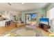 Open living space with a large window showcasing natural light and exterior view at 7102 42Nd E Ct, Sarasota, FL 34243