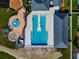 Aerial view of the community pool featuring a unique design and surrounding amenities at 718 Tanana Fall Dr, Ruskin, FL 33570