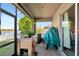 Enclosed patio area with lake views and space for a grill at 718 Tanana Fall Dr, Ruskin, FL 33570