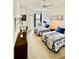 Cozy bedroom with twin beds, soft colors, and lots of natural light, creating a peaceful atmosphere at 8397 38Th Street E Cir # 306, Sarasota, FL 34243