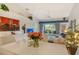 Inviting living area with a dining table and chairs, open to the outdoor space at 9499 Millbank Dr # 2722, Sarasota, FL 34238