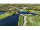 Breathtaking aerial view of the community golf course with lush fairways and scenic water features at 10008 Carnoustie Pl, Bradenton, FL 34211