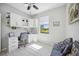 Office space featuring built-in cabinets, desk, and a window with a view at 10008 Carnoustie Pl, Bradenton, FL 34211