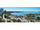 Beautiful aerial view featuring lush tropical landscaping, city skyline, and waterways; a premium property with amazing amenities at 101 S Gulfstream Ave # 16K, Sarasota, FL 34236