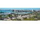 Spectacular aerial view of harbor featuring a variety of boats and yachts, all surrounded by lovely greenery and waterfront condos at 101 S Gulfstream Ave # 16K, Sarasota, FL 34236