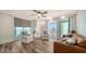 Comfortable living room with balcony access and water views at 101 S Gulfstream Ave # 16K, Sarasota, FL 34236