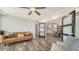 Spacious living room featuring tile floors, modern decor, and access to a dining area at 101 S Gulfstream Ave # 16K, Sarasota, FL 34236