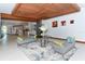 Elegant lobby with modern seating, artistic decor, and a stylish ceiling design at 101 S Gulfstream Ave # 16K, Sarasota, FL 34236