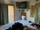 Bedroom featuring neutral walls and a traditional window with blinds at 1104 29Th W Ave, Bradenton, FL 34205