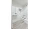 Functional laundry area with custom cabinets and storage solutions, ideal for organized home management at 1216 58Th W St, Bradenton, FL 34209