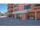 The property features covered parking beneath residential levels, showcasing functional design and convenience for residents at 131 Garfield Dr # 4D, Sarasota, FL 34236