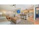 Cozy living room featuring an open layout to the kitchen and comfortable seating at 131 Garfield Dr # 4D, Sarasota, FL 34236