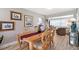 Elegant dining room featuring a wood table with seating for six, stylish decor, and hardwood-style flooring at 1325 Bottlebrush Dr, Bradenton, FL 34208