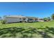 Beautiful single-story home with mature green grass at 1325 Bottlebrush Dr, Bradenton, FL 34208