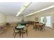 Inviting game room with a pool table, card table, and seating, perfect for leisure and entertainment at 1325 Bottlebrush Dr, Bradenton, FL 34208