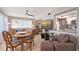 Open floor plan with a dining area, living room, and view into the kitchen at 1325 Bottlebrush Dr, Bradenton, FL 34208