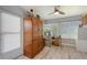 Home office featuring a built-in cabinet, desk, and natural light from the windows at 1325 Bottlebrush Dr, Bradenton, FL 34208