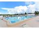 Inviting outdoor pool with crystal-clear water and plenty of seating for sunny relaxation and recreation at 1325 Bottlebrush Dr, Bradenton, FL 34208
