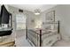 Charming bedroom with floral accents and a window to bring in natural light at 16966 Rosedown Gln, Parrish, FL 34219