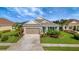 Charming single-story home featuring a well-manicured lawn and inviting curb appeal at 16966 Rosedown Gln, Parrish, FL 34219