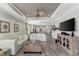 Open-concept floorplan with living room flowing into the kitchen area, great for modern living at 16966 Rosedown Gln, Parrish, FL 34219