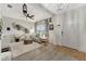 Bright living room featuring stylish decor, modern furnishings, and tile floors at 16966 Rosedown Gln, Parrish, FL 34219