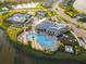 Amenities include a pool, tennis courts, playground, and walking paths by the lake at 17045 Polo Trl, Bradenton, FL 34211
