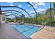 Screened in lanai with pool and hot tub area, with room for seating at 17045 Polo Trl, Bradenton, FL 34211